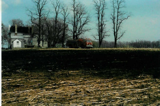 Engine 4-9-1 on the scene of the field fire at Cambridge and Wanner Roads... 4/13/85